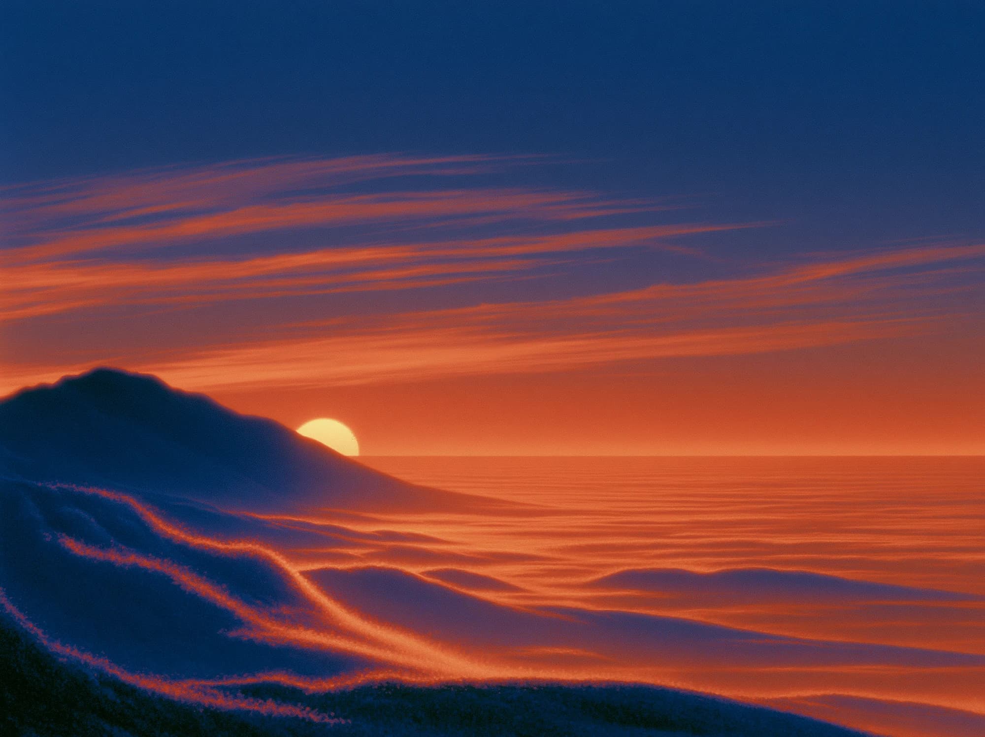 A sun sets into an orange sea beneath streaked clouds, beside a dark blue hill with soft, flowing contours.